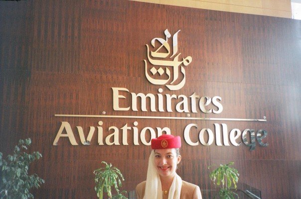 The author in front of a business logo.